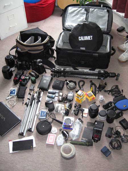 The contents of an old camera bag and flight case. My current one is subtly different, as it's a continually evolving process of choosing gear. Note also there are no personal effects visible — there's never much room for them!